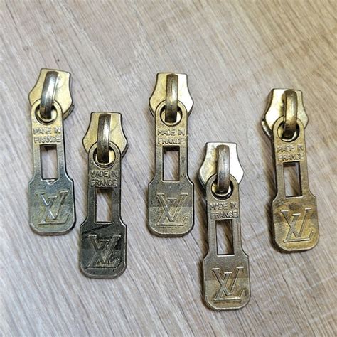 vintage louis vuitton zipper pulls.